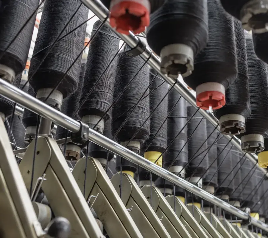 Textile production machinery in an industrial facility